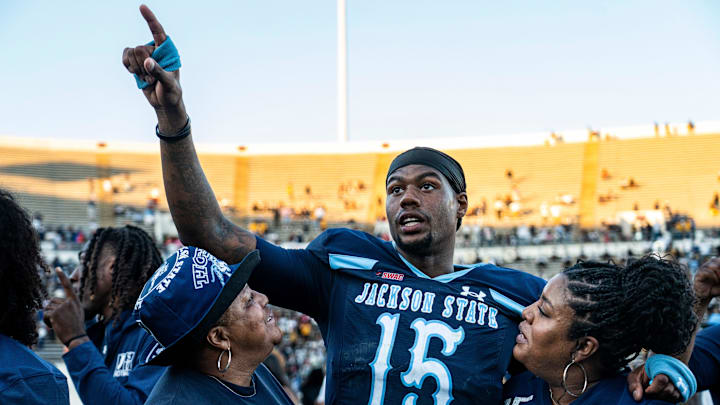 Jackson State quarterback JaCobian Morgan (15) sings the alma mater after a college football game between Jackson State and Alabama State at Mississippi Veterans Memorial Stadium in Jackson, Miss., on Saturday, Oct. 11, 2025. Jackson State defeated Alabama State 38-34.