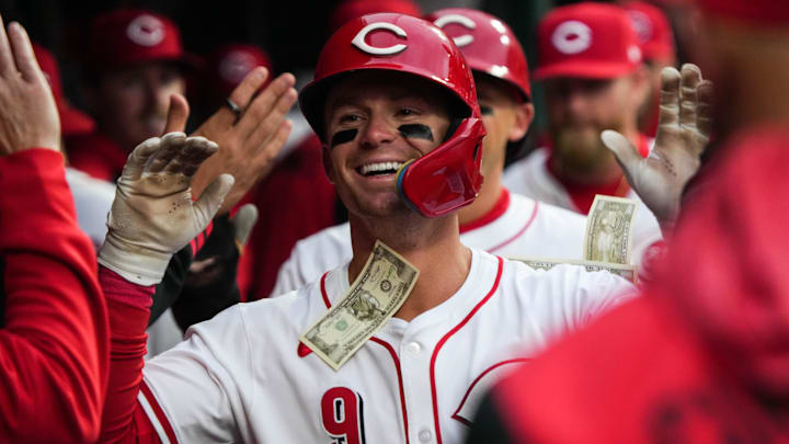 Reds Matt McLain (9) scores a homerun during their game against the Texas Rangers on Monday March 31, 2025 at Great American Ball Park.