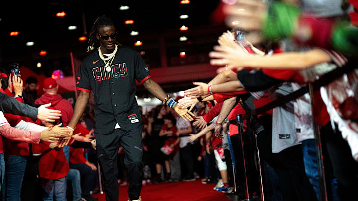 Cincinnati Reds third baseman Elly De La Cruz (44) greets fans during the Cincinnati Reds Redsfest at Duke Energy Convention Center in Cincinnati on Friday, Dec. 1, 2023.