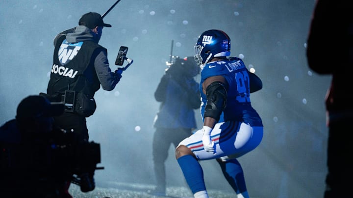 New York Giants defensive tackle Dexter Lawrence (97) dances while running out of the tunnel during a Thursday Night Football game between the New York Giants and the Philadelphia Eagles at MetLife Stadium in East Rutherford on Oct. 9, 2025.