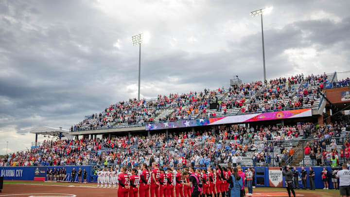 Teams stand for the National Anthem before game 3 between Texas Tech and Ole Miss at the Women’s College World Series at Devon Park in Oklahoma City, on Thursday, May 29, 2025. Teams stand for the National Anthem before game 3 between Texas Tech and Ole Miss at the Women’s College World Series at Devon Park in Oklahoma City, on Thursday, May 29, 2025.