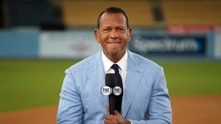Oct 26, 2024; Los Angeles, California, USA; Fox Sports broadcaster Alex Rodriguez speaks on field after game two between the Los Angeles Dodgers and the New York Yankees in the 2024 MLB World Series at Dodger Stadium. 
