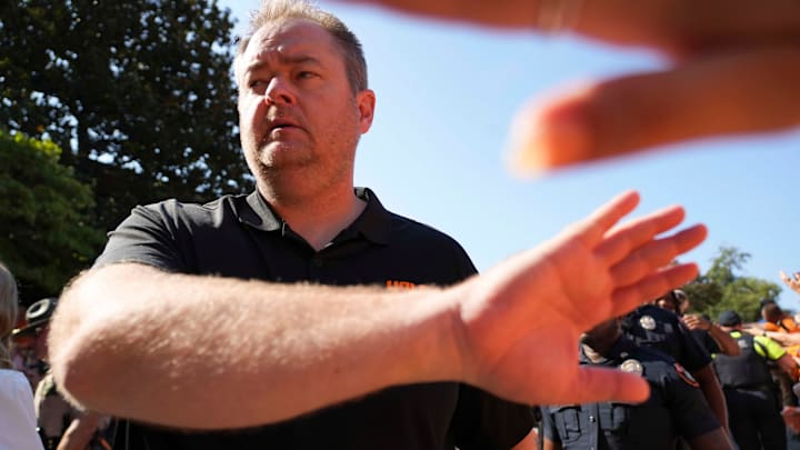 Tennessee head coach Josh Heupel high fives fans during the Vol Walk before a football game between Tennessee and Chattanooga at Neyland Stadium in Knoxville, Tenn., on Saturday, August 31, 2024.