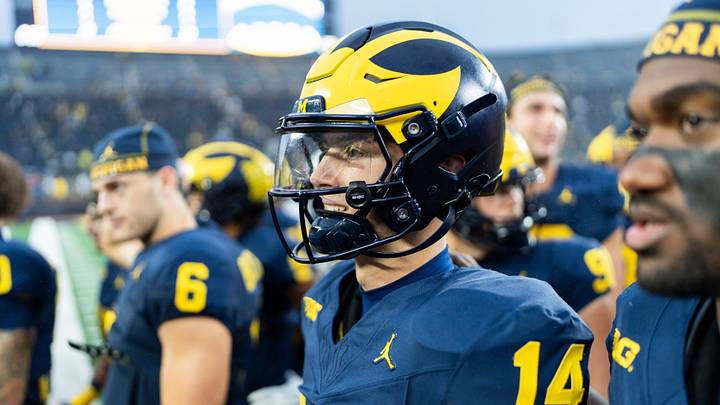 Michigan Wolverines quarterback Tommy Carr (14) waits to the leave the field after defeating UTEP 52-17 at Michigan Stadium in Ann Arbor on Saturday, Sept. 19, 2026.
