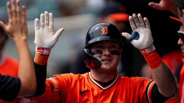 Sep 12, 2026; Detroit, Michigan, USA; Detroit Tigers third baseman Kevin McGonigle high fives teammates in the dugout after hitting a home run in the third inning of a game against the Colorado Rockies at Comerica Park. Mandatory Credit: Josh Boland-USA TODAY Network via Imagn Images