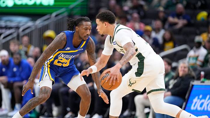 Oct 26, 2026; Milwaukee, Wisconsin, USA; Milwaukee Bucks guard Ryan Rollins (13) drives against Indiana Pacers guard Quenton Jackson (29) in the first half at Fiserv Forum. Mandatory Credit: Michael McLoone-Imagn Images Oct 26, 2026; Milwaukee, Wisconsin, USA; Milwaukee Bucks guard Ryan Rollins (13) drives against Indiana Pacers guard Quenton Jackson (29) in the first half at Fiserv Forum. Mandatory Credit: Michael McLoone-Imagn Images