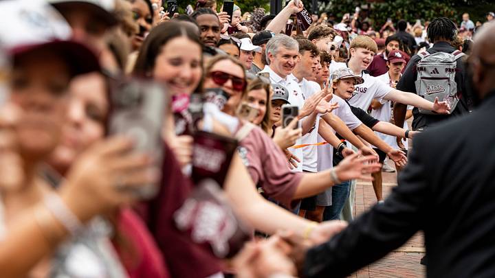 Fans high-five members of the Mississippi State football team during the Dawg Walk before a college football game between Mississippi State and Alabama at Davis Wade Stadium in Starkville, Miss., on Saturday, Oct. 3, 2026.