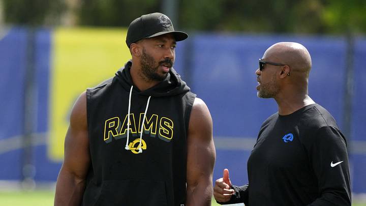 Aug 11, 2026; Woodland Hills, CA, USA; Los Angeles Rams defensive end Myles Garrett (left) talks with vice president of sports medicine and performance Reggie Scott during a joint practice against the Dallas Cowboys at the Rams Practice Facility. Mandatory Credit: Kirby Lee-Imagn Images Aug 11, 2026; Woodland Hills, CA, USA; Los Angeles Rams defensive end Myles Garrett (left) talks with vice president of sports medicine and performance Reggie Scott during a joint practice against the Dallas Cowboys at the Rams Practice Facility. Mandatory Credit: Kirby Lee-Imagn Images