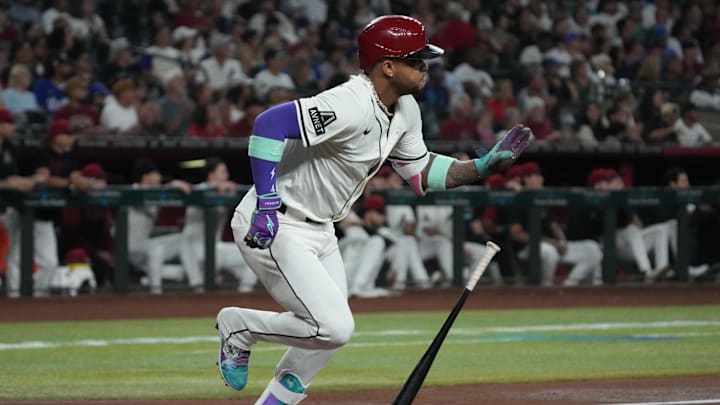 Sep 24, 2025; Phoenix, Arizona, USA; Arizona Diamondbacks second base Ketel Marte (4) hits a double against the Los Angeles Dodgers in the first inning at Chase Field. Mandatory Credit: Rick Scuteri-Imagn Images Sep 24, 2025; Phoenix, Arizona, USA; Arizona Diamondbacks second base Ketel Marte (4) hits a double against the Los Angeles Dodgers in the first inning at Chase Field. Mandatory Credit: Rick Scuteri-Imagn Images