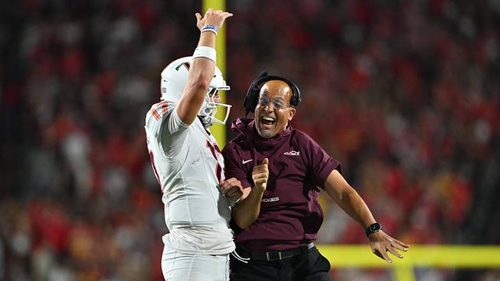 Sep 19, 2026; College Park, Maryland, USA;  Virginia Tech Hokies head coach James Franklin celebrates with quarterback Ethan Grunkemeyer (17) after Grunkemeyer ran for a touchdown in the first half against the Maryland Terrapins at SECU Stadium. Mandatory Credit: Jamie Sabau-Imagn Images