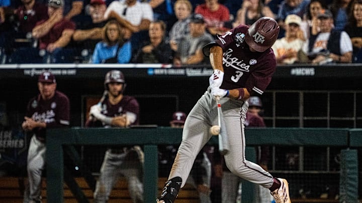 Jun 19, 2024; Omaha, NE, USA; Texas A&M Aggies second baseman Kaeden Kent (3) hits a RBI single against the Florida Gators during the ninth inning at Charles Schwab Field Omaha. Mandatory Credit: Dylan Widger-Imagn Images