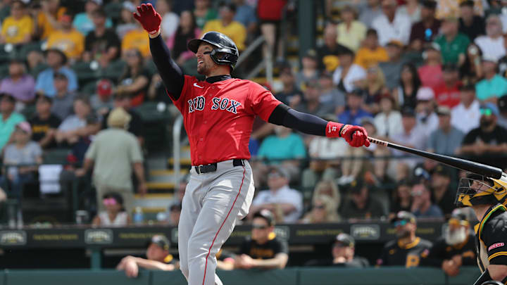 Mar 4, 2025; Bradenton, Florida, USA;  Boston Red Sox center fielder Trayce Thompson (37) hits a 2-run home run during the third inning against the Pittsburgh Pirates at LECOM Park. Mandatory Credit: Kim Klement Neitzel-Imagn Images
