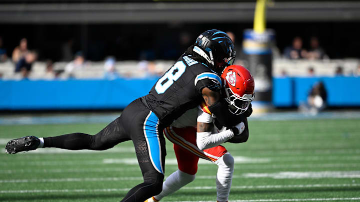 Nov 24, 2024; Charlotte, North Carolina, USA; Kansas City Chiefs wide receiver Xavier Worthy (1) is tackled by Carolina Panthers cornerback Jaycee Horn (8) in the second quarter at Bank of America Stadium. Mandatory Credit: Bob Donnan-Imagn Images Nov 24, 2024; Charlotte, North Carolina, USA; Kansas City Chiefs wide receiver Xavier Worthy (1) is tackled by Carolina Panthers cornerback Jaycee Horn (8) in the second quarter at Bank of America Stadium. Mandatory Credit: Bob Donnan-Imagn Images