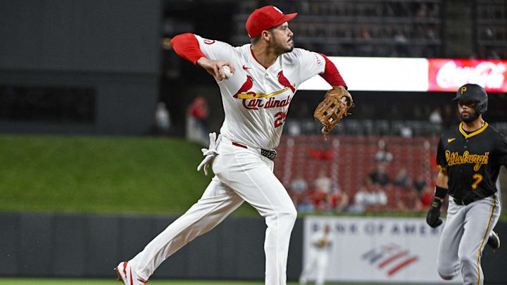 Sep 18, 2024; St. Louis, Missouri, USA; St. Louis Cardinals third baseman Nolan Arenado (28) forces out Pittsburgh Pirates shortstop Isiah Kiner-Falefa (7) and throws to first to complete the double play to end the third inning at Busch Stadium. Mandatory Credit: Jeff Curry-Imagn Images Sep 18, 2024; St. Louis, Missouri, USA; St. Louis Cardinals third baseman Nolan Arenado (28) forces out Pittsburgh Pirates shortstop Isiah Kiner-Falefa (7) and throws to first to complete the double play to end the third inning at Busch Stadium. Mandatory Credit: Jeff Curry-Imagn Images