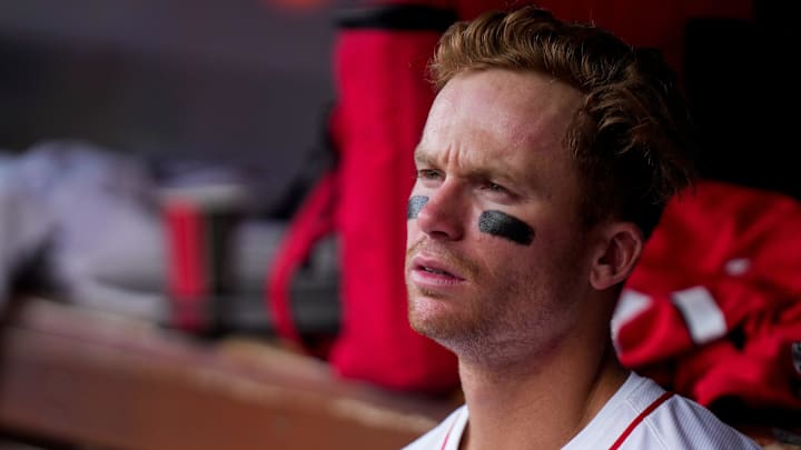 Cincinnati Reds shortstop Matt McLain (9) looks on from the dugout in the fourth inning of the MLB Interleague game between the Cincinnati Reds and the Texas Rangers at Great American Ball Park in downtown Cincinnati on Wednesday, April 2, 2025. The Rangers led 1-0 after four innings. Cincinnati Reds shortstop Matt McLain (9) looks on from the dugout in the fourth inning of the MLB Interleague game between the Cincinnati Reds and the Texas Rangers at Great American Ball Park in downtown Cincinnati on Wednesday, April 2, 2025. The Rangers led 1-0 after four innings.
