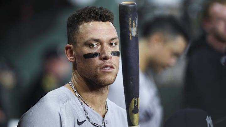 Sep 3, 2025; Houston, Texas, USA; New York Yankees designated hitter Aaron Judge (99) stands in the dugout during the second inning against the Houston Astros at Daikin Park. Mandatory Credit: Troy Taormina-Imagn Images