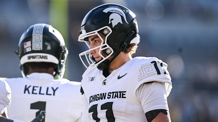 Nov 22, 2025; Iowa City, Iowa, USA; Michigan State Spartans quarterback Alessio Milivojevic (11) looks on before the game against the Iowa Hawkeyes at Kinnick Stadium. Mandatory Credit: Jeffrey Becker-Imagn Images