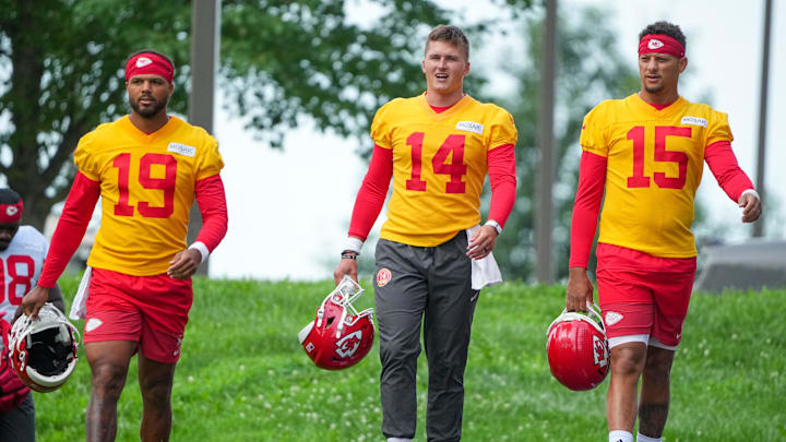 Jul 22, 2025; St. Joseph, MO, USA; Kansas City Chiefs quarterbacks Chris Oladokun (19) and quarterback Bailey Zappe (14) and Patrick Mahomes (15) walk down the hill to the practice fields during training camp at Missouri Western State University. Mandatory Credit: Denny Medley-Imagn Images