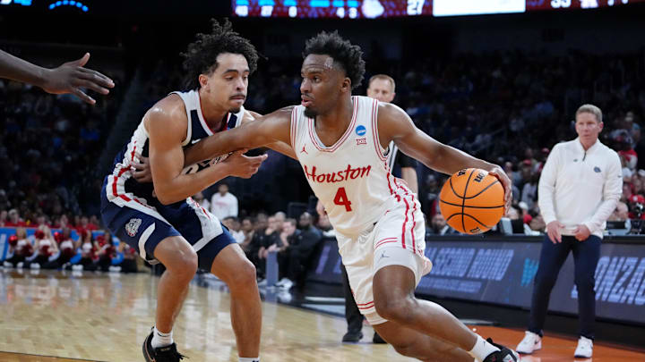 Houston Cougars guard L.J. Cryer drives to the basket against Gonzaga Bulldogs guard Ryan Nembhard. Mandatory Credit: Kirby Lee-Imagn Images