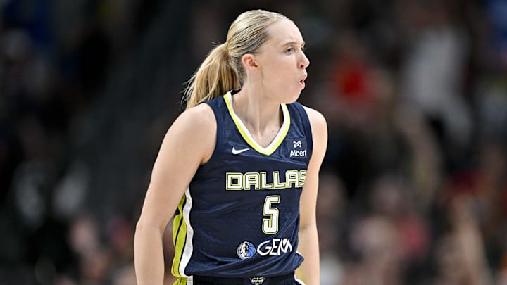 Jun 27, 2025; Dallas, Texas, USA; Dallas Wings guard Paige Bueckers (5) celebrates during the second half against the Indiana Fever at the American Airlines Center. Mandatory Credit: Jerome Miron-Imagn Images