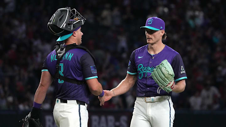 Jul 5, 2025; Phoenix, Arizona, USA; Arizona Diamondbacks catcher James McCann (8) and pitcher Shelby Miller (18) celebrate after defeating the Arizona Diamondbacks at Chase Field. Mandatory Credit: Rick Scuteri-Imagn Images Jul 5, 2025; Phoenix, Arizona, USA; Arizona Diamondbacks catcher James McCann (8) and pitcher Shelby Miller (18) celebrate after defeating the Arizona Diamondbacks at Chase Field. Mandatory Credit: Rick Scuteri-Imagn Images