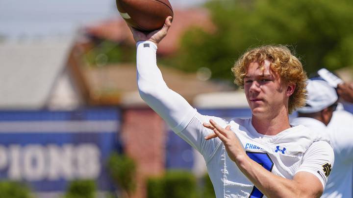 Oregon commit at quarterback Will Mencl (7) throws a pass during spring football showcase at Chandler High School in Chandler on May 12, 2026. Mencl competes in the Elite 11 Finals this weekend in Los Angeles.