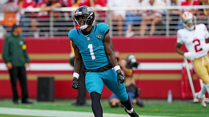 Sep 28, 2025; Santa Clara, California, USA; Jacksonville Jaguars running back Travis Etienne Jr. (1) reacts after scoring a touchdown during the first half against the San Francisco 49ers at Levi's Stadium. Mandatory Credit: Darren Yamashita-Imagn Images