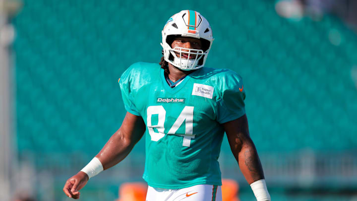 Miami Dolphins defensive tackle Jordan Phillips (94) looks on from the field during training camp at Baptist Health Training Complex. Miami Dolphins defensive tackle Jordan Phillips (94) looks on from the field during training camp at Baptist Health Training Complex.