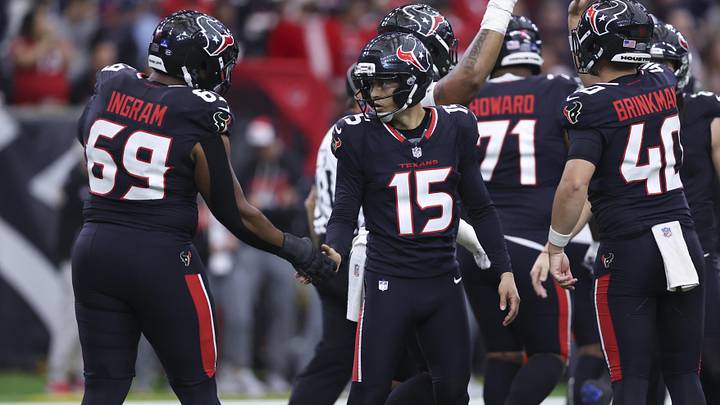 Dec 14, 2025; Houston, Texas, USA; Houston Texans place kicker Ka'Imi Fairbairn (15) celebrates with guard Ed Ingram (69) after kicking a field goal during the game against the Arizona Cardinals at NRG Stadium. Mandatory Credit: Troy Taormina-Imagn Images