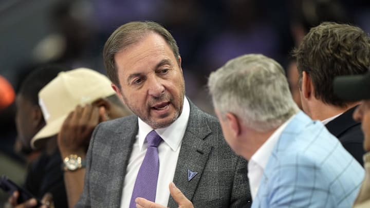 May 16, 2025; San Francisco, California, USA; Golden State Valkyries owner Joe Lacob (facing camera) sits courtside during the second quarter against the Los Angeles Sparks at Chase Center. Mandatory Credit: Darren Yamashita-Imagn Images