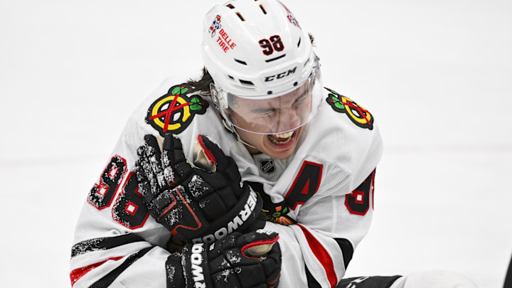 Dec 12, 2025; St. Louis, Missouri, USA; Chicago Blackhawks center Connor Bedard (98) reacts in pain after a face off against St. Louis Blues center Brayden Schenn (not pictured) during the third period at Enterprise Center. Mandatory Credit: Jeff Curry-Imagn Images
