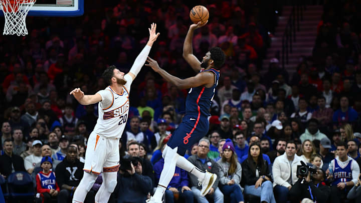 Nov 4, 2023; Philadelphia, Pennsylvania, USA; Philadelphia 76ers center Joel Embiid (21) shoots the ball against Phoenix Suns center Jusuf Nurkic (20) in the first quarter at Wells Fargo Center. Mandatory Credit: Kyle Ross-Imagn Images
