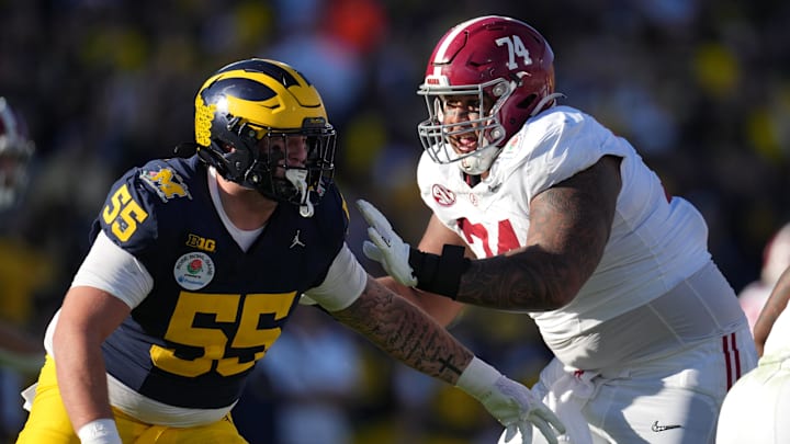 Jan 1, 2024; Pasadena, CA, USA; Alabama Crimson Tide offensive lineman Kadyn Proctor (74) blocks Michigan Wolverines defensive lineman Mason Graham (55) during the first half in the 2024 Rose Bowl college football playoff semifinal game at Rose Bowl. Mandatory Credit: Kirby Lee-Imagn Images