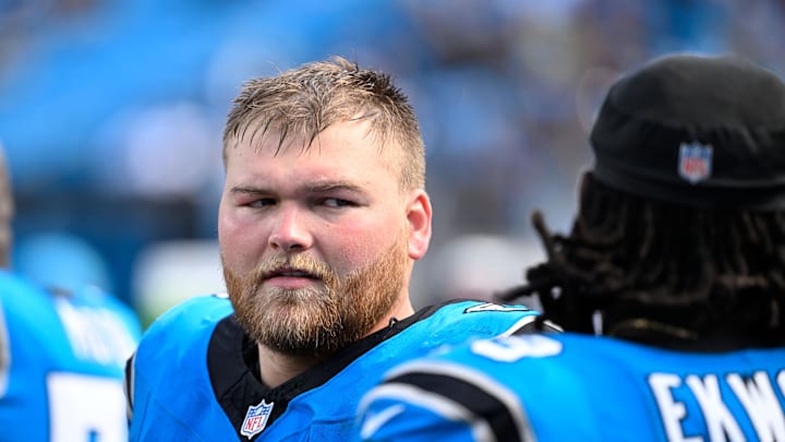 Sep 21, 2025; Charlotte, North Carolina, USA;  Carolina Panthers center Cade Mays (64) with offensive tackle Ikem Ekwonu (79) on the sidelines in the fourth quarter at Bank of America Stadium. Mandatory Credit: Bob Donnan-Imagn Images
