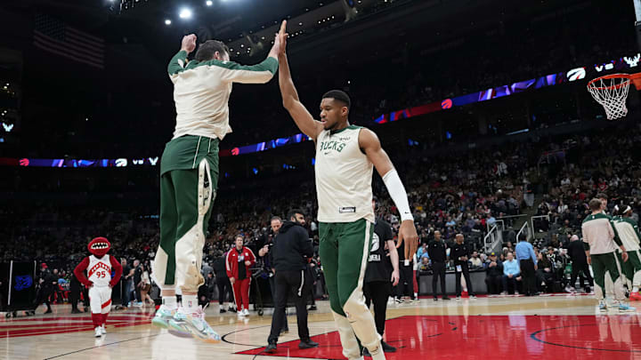 Jan 6, 2025; Toronto, Ontario, CAN; Milwaukee Bucks forward Giannis Antetokounmpo (34) is introduced and high fives guard Pat Connaughton (24) before the start of a game against the Toronto Raptors at Scotiabank Arena. Mandatory Credit: Nick Turchiaro-Imagn Images Jan 6, 2025; Toronto, Ontario, CAN; Milwaukee Bucks forward Giannis Antetokounmpo (34) is introduced and high fives guard Pat Connaughton (24) before the start of a game against the Toronto Raptors at Scotiabank Arena. Mandatory Credit: Nick Turchiaro-Imagn Images