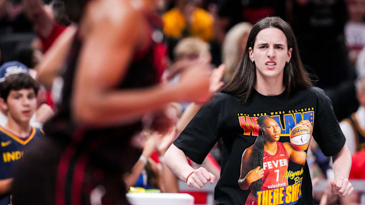 Indiana Fever guard Caitlin Clark (22) celebrates Indiana Fever guard Kelsey Mitchell (0) on Saturday, Aug. 9, 2025, during a game between the Indiana Fever and the Chicago Sky at Gainbridge Fieldhouse in Indianapolis.