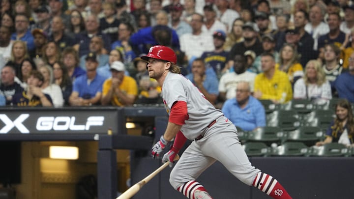 Sep 12, 2025; Milwaukee, Wisconsin, USA; St. Louis Cardinals second base Brendan Donovan (33) gets a base hit against the Milwaukee Brewers in the seventh inning at American Family Field. Mandatory Credit: Michael McLoone-Imagn Images
