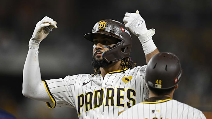 Oct 2, 2024; San Diego, California, USA; San Diego Padres outfielder Fernando Tatis Jr. (23) reacts after a single during the fourth inning of game two in the Wildcard round for the 2024 MLB Playoffs against the Atlanta Braves at Petco Park. Mandatory Credit: Denis Poroy-Imagn Images