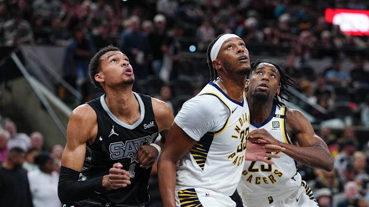 Mar 3, 2024; San Antonio, Texas, USA; San Antonio Spurs center Victor Wembanyama (1) and Indiana Pacers center Myles Turner (33) battle for position in the second half at Frost Bank Center. Mandatory Credit: Daniel Dunn-Imagn Images