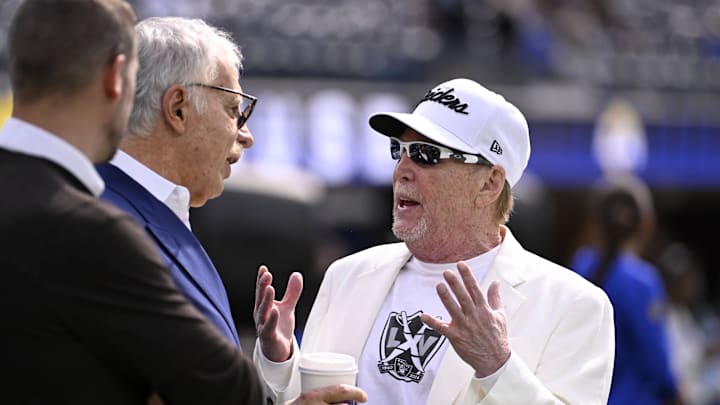Oct 20, 2024; Inglewood, California, USA; Las Vegas Raiders owner Mark Davis, right, talks with Los Angeles Rams owner Stan Kroenke before an NFL game at SoFi Stadium. Mandatory Credit: Alex Gallardo-Imagn Images