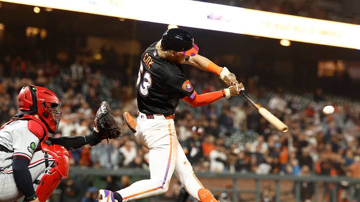 Sep 22, 2026; San Francisco, California, USA; San Francisco Giants second baseman Jonah Cox (53) hits an RBI single during the ninth inning against the Minnesota Twins at Oracle Park. Mandatory Credit: Kelley L Cox-Imagn Images