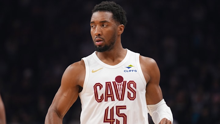 Mar 21, 2025; Phoenix, Arizona, USA; Cleveland Cavaliers guard Donovan Mitchell (45) looks on against the Phoenix Suns during the first half at Footprint Center. Mandatory Credit: Joe Camporeale-Imagn Images