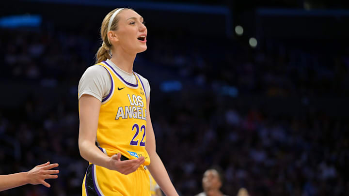 Sep 11, 2025; Los Angeles, California, USA; Los Angeles Sparks forward Cameron Brink (22) reacts after she was called for a foul on Las Vegas Aces center A'ja Wilson (22) during the first half at Crypto.com Arena. Mandatory Credit: Jayne Kamin-Oncea-Imagn Images