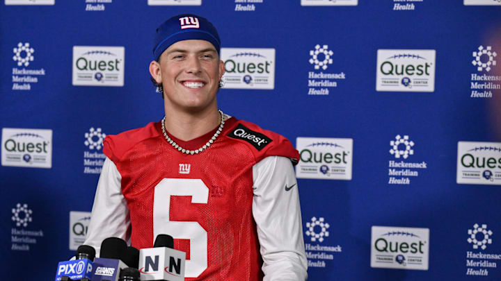 May 9, 2025; East Rutherford, NJ, USA; New York Giants quarterback Jaxson Dart (6) speaks to members of the press after rookie minicamp at Quest Diagnostics Training Center. May 9, 2025; East Rutherford, NJ, USA; New York Giants quarterback Jaxson Dart (6) speaks to members of the press after rookie minicamp at Quest Diagnostics Training Center.