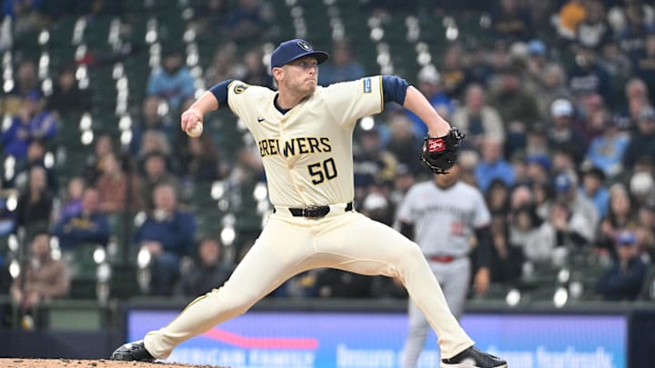 Milwaukee Brewers relief pitcher J.B. Bukauskas delivers a pitch against the Minnesota Twins in the fifth inning at American Family Field in 2024.