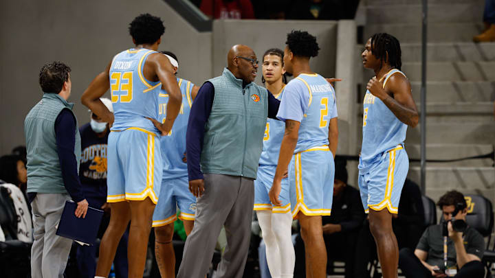 Dec 21, 2025; Waco, Texas, USA; Southern University Jaguars head coach Kevin Johnson speaks with his team during timeout during the first half against the Baylor Bears at Paul and Alejandra Foster Pavilion. Mandatory Credit: Chris Jones-Imagn Images