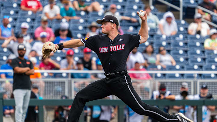 Jun 17, 2025; Omaha, Neb, USA; Louisville Cardinals pitcher Wyatt Danilowicz (24) pitches against the Oregon State Beavers during the ninth inning at Charles Schwab Field. Mandatory Credit: Dylan Widger-Imagn Images