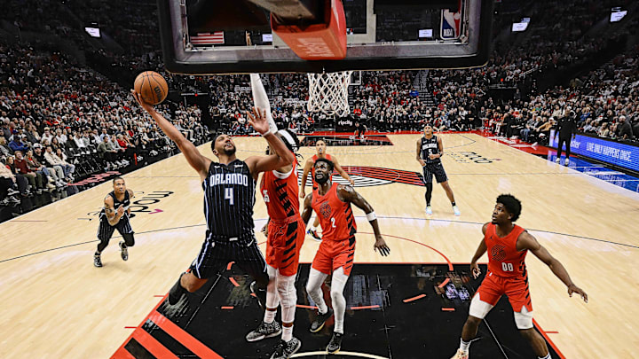Oct 27, 2023; Portland, Oregon, USA; Orlando Magic guard Jalen Suggs (4) drives to the basket during