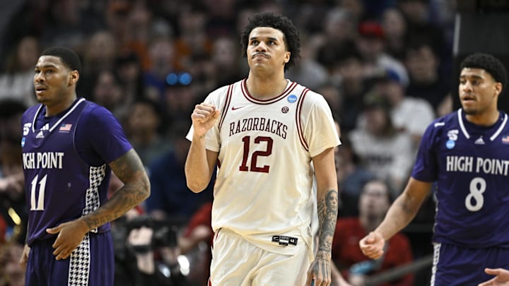 Mar 21, 2026; Portland, OR, USA; Arkansas Razorbacks forward Malique Ewin (12) reacts after a play in the second half against the High Point Panthers during a second round game of the men's 2026 NCAA Tournament at Moda Center. Mandatory Credit: Craig Strobeck-Imagn Images