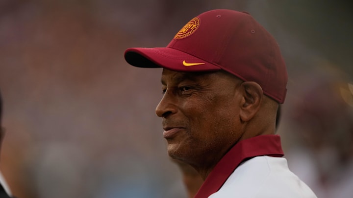 Sep 10, 2022; Stanford, California, USA;  Retired San Francisco 49ers safety Ronnie Lott smiles on the sidelines during the third quarter of the game between Stanford Cardinal and USC Trojans at Stanford Stadium. Mandatory Credit: Stan Szeto-Imagn Images